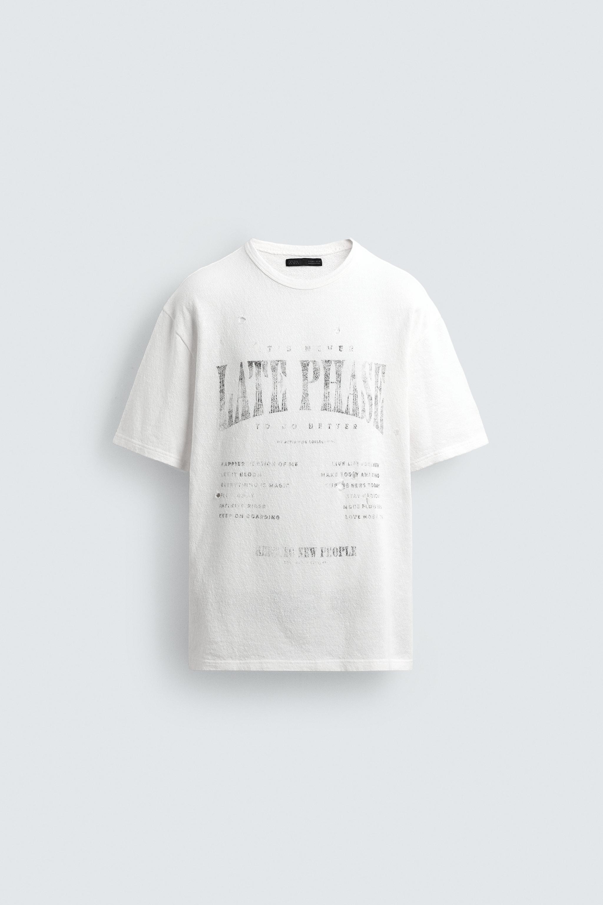 T-SHIRT EN MAILLE À IMPRIMÉS DÉLAVÉS